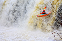 Paddling dager axiom on the river mellte waterfall