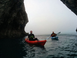 Kayaking through Durdle Door on a Perception Triumph 13 Comfort