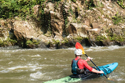 titan nymph kayak paddling on river