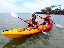 a family paddling the viking 2 plus 1