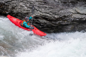 The Dagger Indra boofing a on a white water river