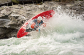 Kickflipping the Dagger Indra whitewater kayak