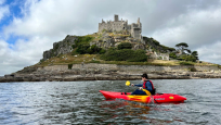 paddling the Nomad Sport on the coast of Cornwall