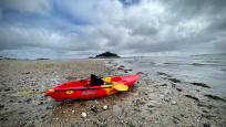 The Feelfree Nomad Sport using the bungee paddle holder