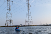 The Riot Enduro 13 kayak being paddled by Connor (Staff member)