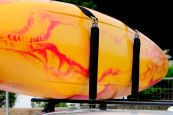 A kayak strapped to the RUK Padded Uprights