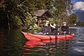 Family out on the water paddling the Gumotex Seawave