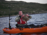 nice spotted ray caught on the wilderness systems tarpon 100 - southampton canoes