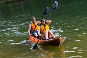 tandem kayak with two adult paddlers showing it's versatility